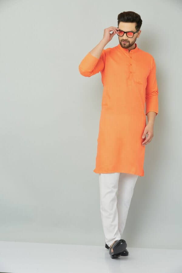Orange kurta with intricate patterns and designs.