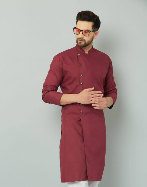 Maroon cotton Indian kurta with buttoned front.