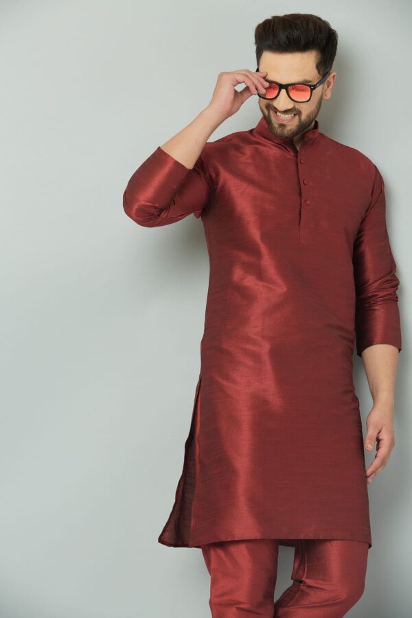 Elegant maroon silk kurta with intricate detailing.